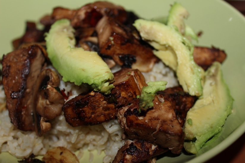 Pan fried tofu and mushroom over beans and rice! So Delicious!