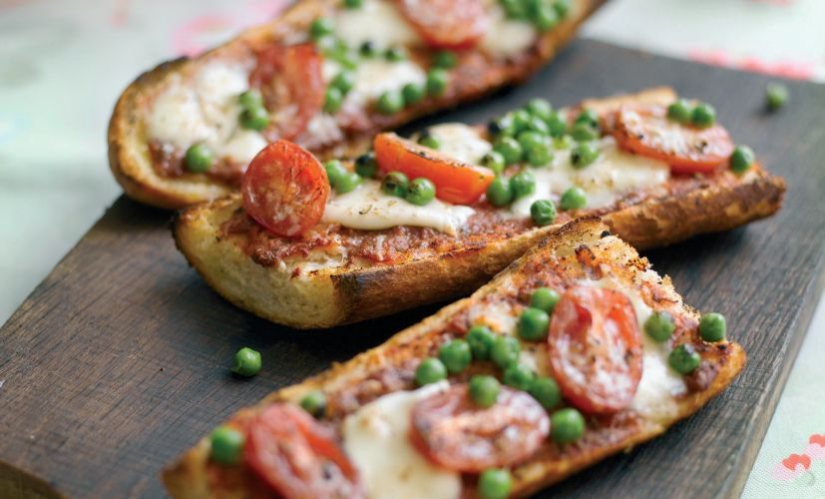 French Bread Pizzas with Peas, Cherry Tomatoes and Mozzarella Recipe: Veggie