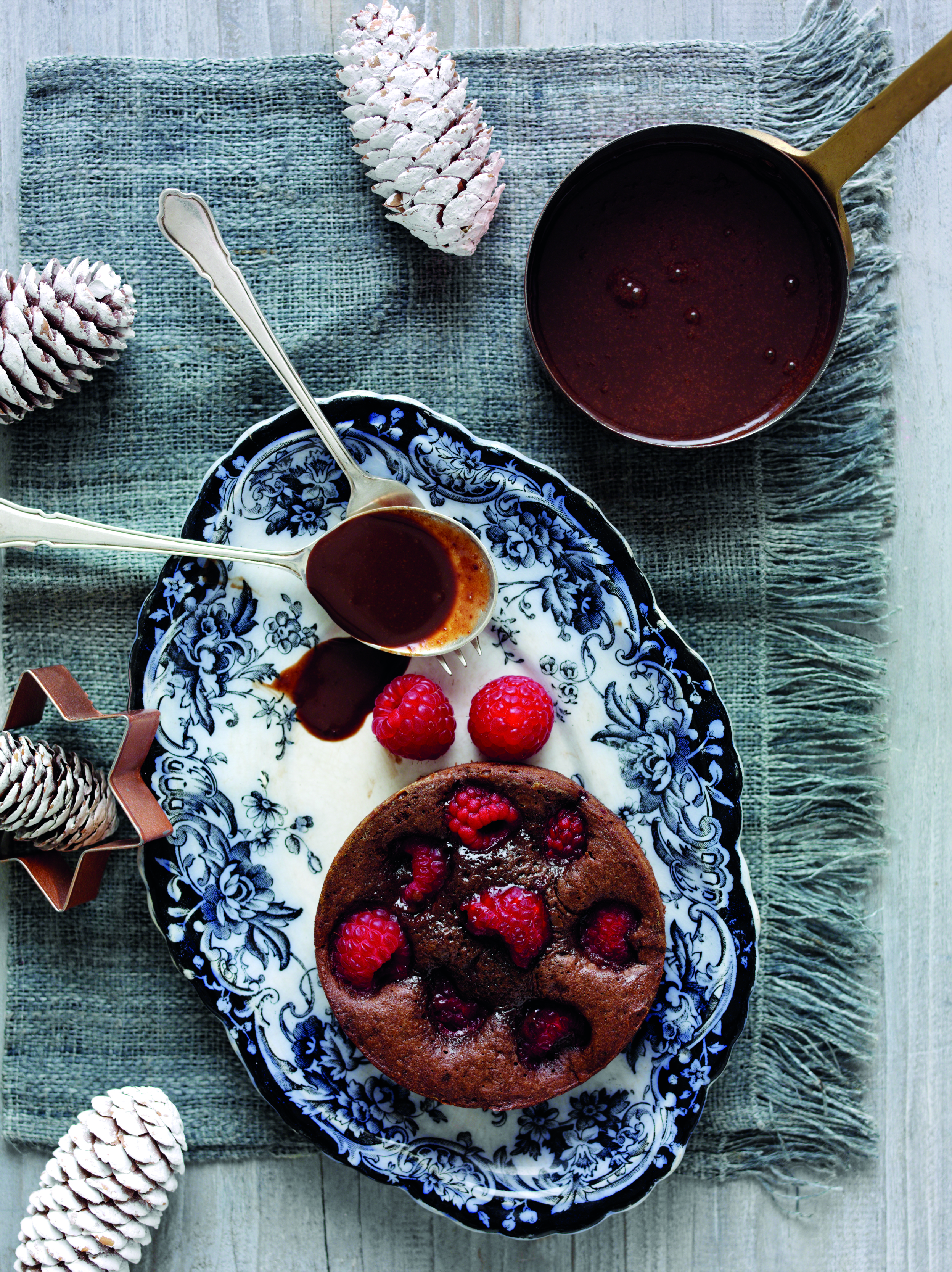 Baked Raspberry and Chocolate Puddings with Rich Dark Chocolate Sauce