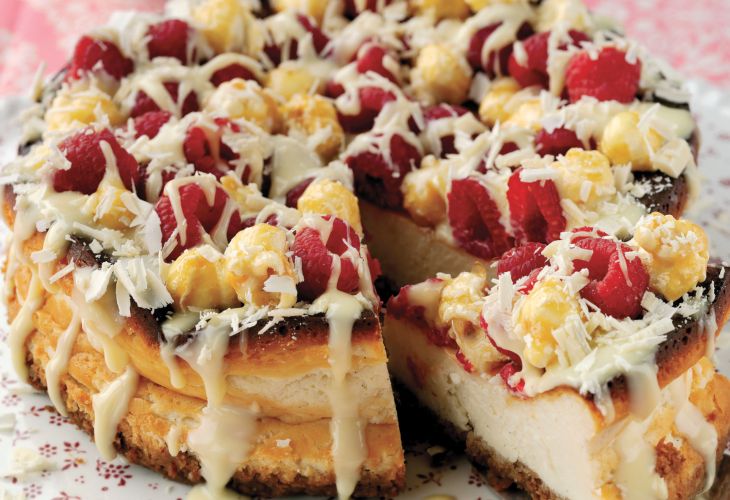 Baked Cheesecake with Raspberries, Popcorn and White Chocolate Sauce